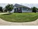 Inviting home with manicured lawn, complemented by tidy landscaping and charming curb appeal at 195 Willow Valley Dr, Mooresville, NC 28115