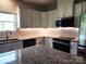 Kitchen featuring granite countertops, white cabinets and stainless steel appliances and subway tile backsplash at 195 Willow Valley Dr, Mooresville, NC 28115