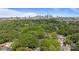 Amazing view of Charlotte's skyline from home neighborhood that features mature trees and green landscape at 2130 Chesterfield Ave, Charlotte, NC 28205