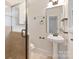 Renovated bathroom with a glass shower, and tiled floors at 2130 Chesterfield Ave, Charlotte, NC 28205