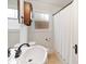 Bright bathroom features a window, vanity, and new toilet at 2130 Chesterfield Ave, Charlotte, NC 28205