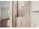 Bathroom features glass shower, tiled floors and new vanity at 2130 Chesterfield Ave, Charlotte, NC 28205