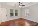 Bedroom with hardwood floors, ceiling fan and natural light at 2130 Chesterfield Ave, Charlotte, NC 28205