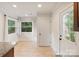Bright dining area with large windows and views of the backyard at 2130 Chesterfield Ave, Charlotte, NC 28205