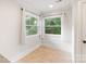 Bright dining area with multiple windows and natural light at 2130 Chesterfield Ave, Charlotte, NC 28205