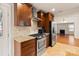 Updated kitchen featuring stainless steel appliances, granite countertops, and custom cabinets at 2130 Chesterfield Ave, Charlotte, NC 28205