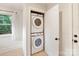 Convenient laundry closet with stacked washer and dryer at 2130 Chesterfield Ave, Charlotte, NC 28205