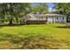 Backyard view of a home with a raised deck and storage underneath at 2222 19Th Ne Ave, Hickory, NC 28601