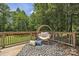 Outdoor deck with a hanging chair and an area rug at 2222 19Th Ne Ave, Hickory, NC 28601