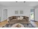 Cozy living room with a stylish couch, modern wall art, and bright natural light at 2222 19Th Ne Ave, Hickory, NC 28601