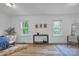 Bright living room with wood floors, natural light, and a comfortable seating area at 2222 19Th Ne Ave, Hickory, NC 28601