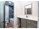 Bathroom featuring a shower over bath and a white vanity at 240 Mark Ryan Ln, Dallas, NC 28034