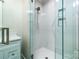 Elegant bathroom showcasing a glass-enclosed shower with white tile and hexagon tile flooring at 240 Mark Ryan Ln, Dallas, NC 28034