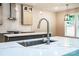 Modern kitchen with marble countertops, stainless steel appliances, and a stylish faucet fixture at 240 Mark Ryan Ln, Dallas, NC 28034