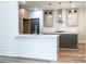 Modern kitchen with white countertops and light and dark gray cabinets at 240 Mark Ryan Ln, Dallas, NC 28034
