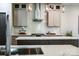Bright kitchen with sleek countertops, white subway tile backsplash, and modern appliances at 240 Mark Ryan Ln, Dallas, NC 28034