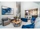 Bright living room with an open kitchen, comfortable seating, and modern decor at 240 Mark Ryan Ln, Dallas, NC 28034