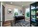 Spacious office with wood floors, natural light, and organized shelving at 240 Mark Ryan Ln, Dallas, NC 28034