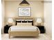 Comfortable bedroom featuring a stylish bed frame, nightstands and lamps at 2837 Morning Song Way, Lancaster, SC 29720