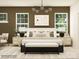 Cozy bedroom featuring a comfortable bed, windows and lighting fixture at 2837 Morning Song Way, Lancaster, SC 29720