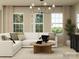 Inviting living room featuring a comfortable sectional sofa and plenty of natural light at 2837 Morning Song Way, Lancaster, SC 29720