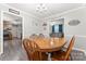 Bright dining room featuring hardwood floors and a glimpse into other living spaces at 308 Home Rd, Salisbury, NC 28147