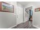 Welcoming foyer featuring neutral walls, wood-look floors, and natural light at 308 Home Rd, Salisbury, NC 28147