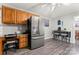 Cozy kitchen showcases stainless steel fridge, breakfast nook, and ample cabinet space at 308 Home Rd, Salisbury, NC 28147