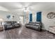 Spacious living area with hardwood floors, neutral walls, and large window at 308 Home Rd, Salisbury, NC 28147
