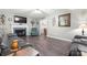A cozy living room with hardwood floors, a fireplace, and comfortable seating at 308 Home Rd, Salisbury, NC 28147