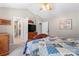 A relaxing main bedroom with a view into the ensuite bathroom and a ceiling fan at 308 Home Rd, Salisbury, NC 28147