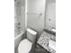Bright bathroom featuring a shower-tub combo, white fixtures, and granite vanity top at 3090 Bridgewater St, Lancaster, SC 29720