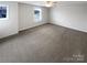 A clean, empty bedroom with lots of natural light at 3090 Bridgewater St, Lancaster, SC 29720