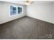 A clean, empty bedroom with lots of natural light at 3090 Bridgewater St, Lancaster, SC 29720