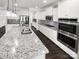 Elegant kitchen with stainless steel appliances and granite countertops at 3090 Bridgewater St, Lancaster, SC 29720