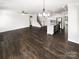 Bright, open-concept living space seamlessly connects the kitchen, dining, and living areas at 3090 Bridgewater St, Lancaster, SC 29720