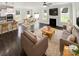 Bright, open-concept living space seamlessly connects the kitchen, dining, and living areas at 3090 Bridgewater St, Lancaster, SC 29720