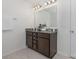 Bathroom features a double sink vanity with granite countertops and modern fixtures at 4060 Beacon Ave # 148, Monroe, NC 28110