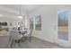 Cozy dining area with white walls, modern furniture, and an abundance of natural light at 4060 Beacon Ave # 148, Monroe, NC 28110