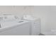 Efficient laundry area with modern white washer and dryer units ready for use at 4060 Beacon Ave # 148, Monroe, NC 28110