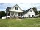 Charming two-story home with black shutters and inviting front porch at 4282 Brandy Creek Ct, Clover, SC 29710
