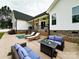 Stylish patio with lounge chairs, a fire pit table, and a cozy seating area at 4282 Brandy Creek Ct, Clover, SC 29710