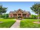 Clubhouse with stone facade, manicured landscaping, and inviting entrance at 5056 Crandon Rd, Fort Mill, SC 29707