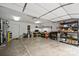 Spacious garage with ample storage, workbench area, and convenient access at 5179 Poplar Glen Dr, Matthews, NC 28104