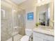 Bathroom with a granite countertop, a white vanity, and a glass shower door at 612 Ideal Way, Charlotte, NC 28203
