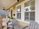 Inviting front porch with comfortable seating and stylish decor offers a welcoming entrance to the home at 612 Ideal Way, Charlotte, NC 28203
