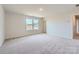 Spacious bedroom with neutral carpet, bright window, and ample natural light at 6331 Fairfax Ct, Maiden, NC 28650