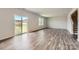 Bright living room featuring stylish floors and a sliding glass door to outdoor space at 6331 Fairfax Ct, Maiden, NC 28650