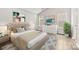 Inviting bedroom with vaulted ceilings, abundant natural light, and tasteful decor at 6340 Green Vista Ct, Charlotte, NC 28212