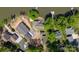 Stunning aerial view of a lakefront home with a private dock and lush landscaping at 639 Panther Point Trl, Richfield, NC 28137